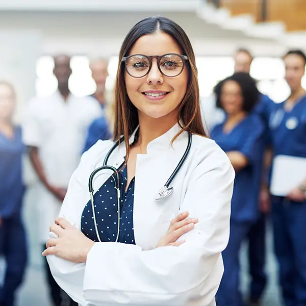 Doctor at her practice with medical team