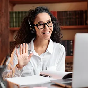 Happy female business owner in a web consultation meeting