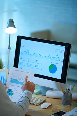 Analytics researcher at desk