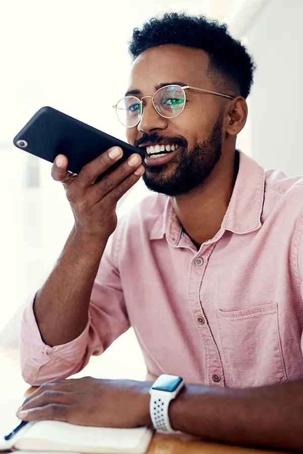 Man making voice search on phone